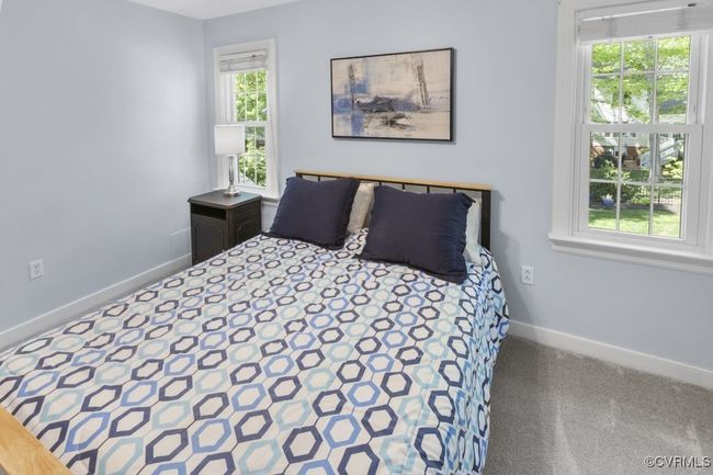 Bedroom featuring baseboards and carpet flooring | Image 31
