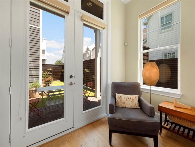 Sitting room with plenty of natural light, light wood-style floors, and baseboards | Image 22