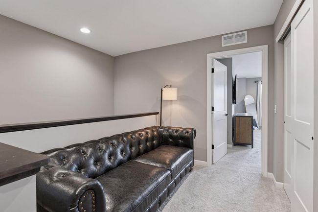 The upper level Loft is a great space to curl up with a good book. | Image 12