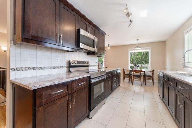 8003 Ranchview Drive Nw, House other with 4 bedrooms, 3 bathrooms and 3 parking in Calgary AB | Image 11