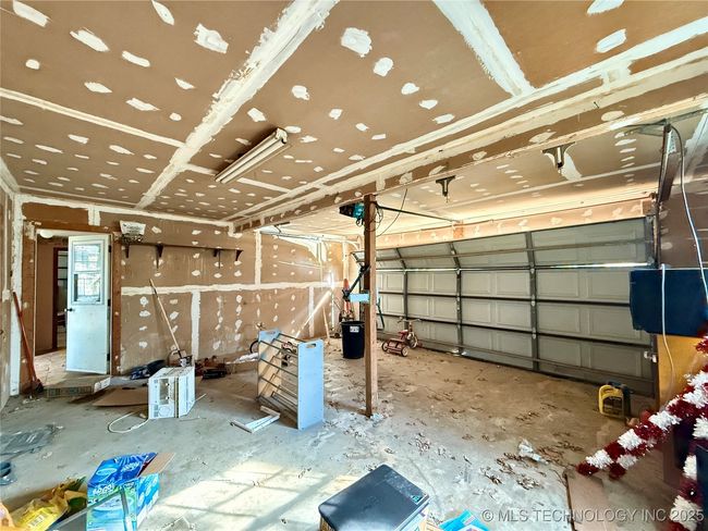 ATTACHED GARAGE WITH ACCESS TO THE HOUSE FROM THE LAUNDRY ROOM AND EXTERIOR BACK DOOR AS WELL | Image 14