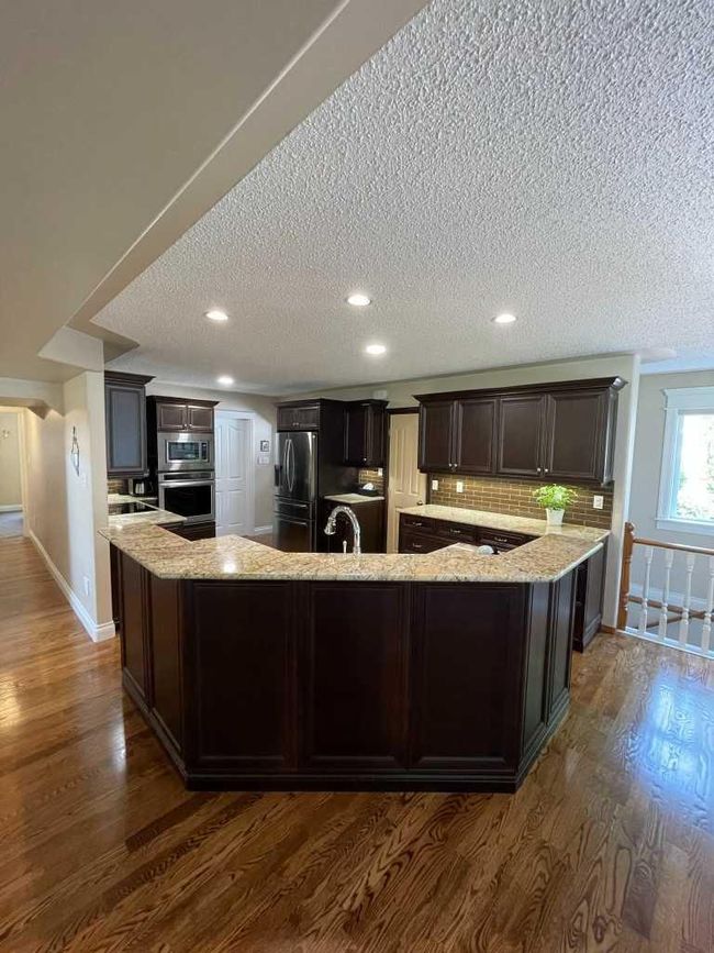 24 Evergreen Park Close W, Home with 4 bedrooms, 3 bathrooms and 5 parking in Brooks AB | Image 19