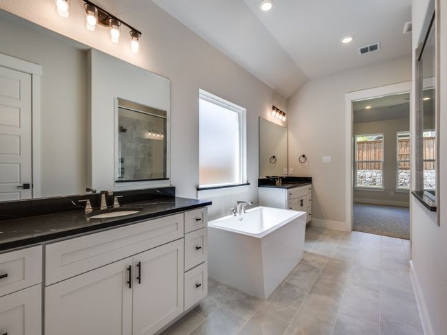No shortage of space or style in this wonderful owner's bath! | Image 13
