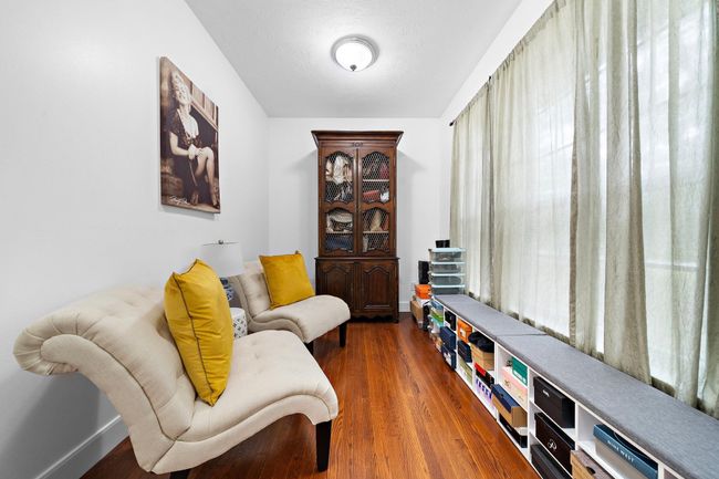 Cozy room with large windows and a quiet ambiance | Image 35