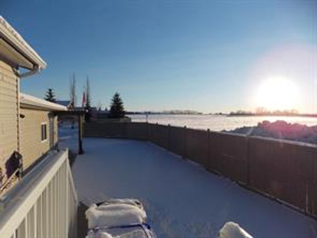 77 - 5210 65 Ave, Home with 3 bedrooms, 2 bathrooms and 3 parking in Olds AB | Image 43