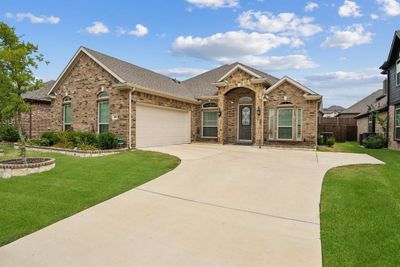 View of front of home, garage and J-swing drive | Image 2