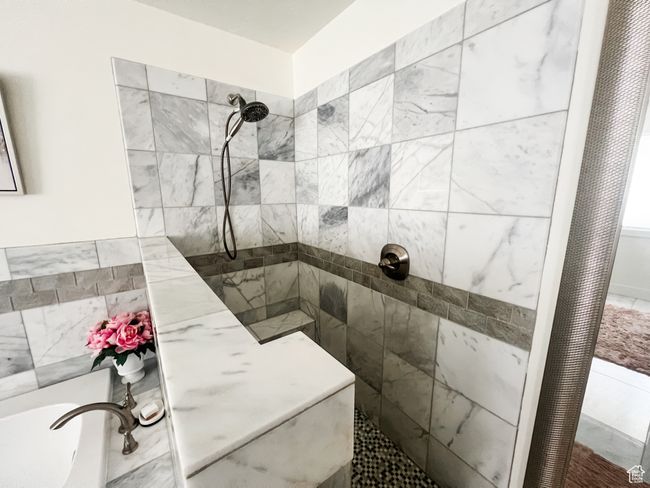 Full bathroom featuring marble tiled shower | Image 29