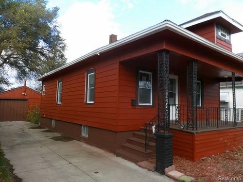 1424 Acacia St, Saginaw, MI, 48602-2814 | Card Image