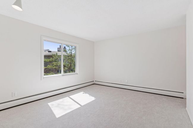 Primary bedroom with full wall closet | Image 14