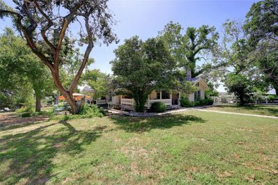 23351 Fm 150 W, Home with 7 bedrooms, 7 bathrooms and 6 parking in Driftwood TX | Image 2