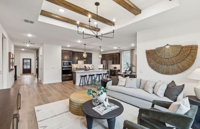 Bright gathering room with large windows *Photos of furnished model. Not actual home. Representative of floor plan. Some options and features may vary | Image 10
