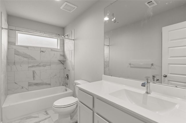This photo is for illustrative purposes only and is not to be considered an exact replica of the finished home. Rendering does not match the finished product in terms of features, colors, landscaping, etc. Pricing, specifications, square footage and materials are subject to change at any time and without notice. | Image 12