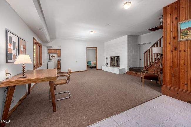 Lower Level Living Room and Fireplace | Image 30