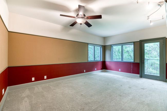 Primary suite with balcony. | Image 16