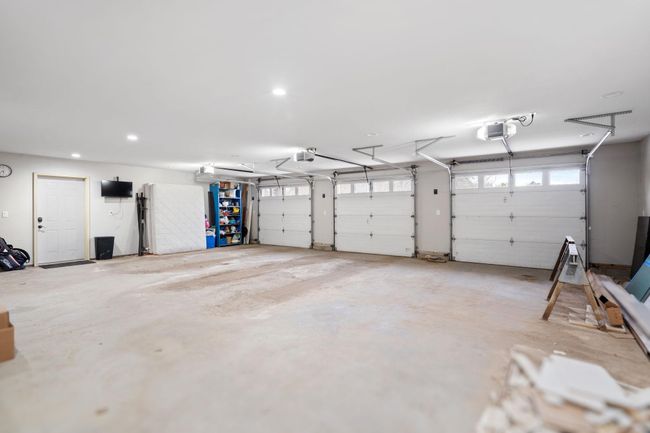 Tuck-under garage with room for up to four vehicles | Image 31
