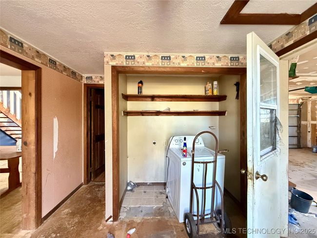 LAUNDRY ROOM BETWEEN THE KITCHEN AND GARAGE, ALSO HAS ENTRY TO THE GUEST BATHROOM | Image 13