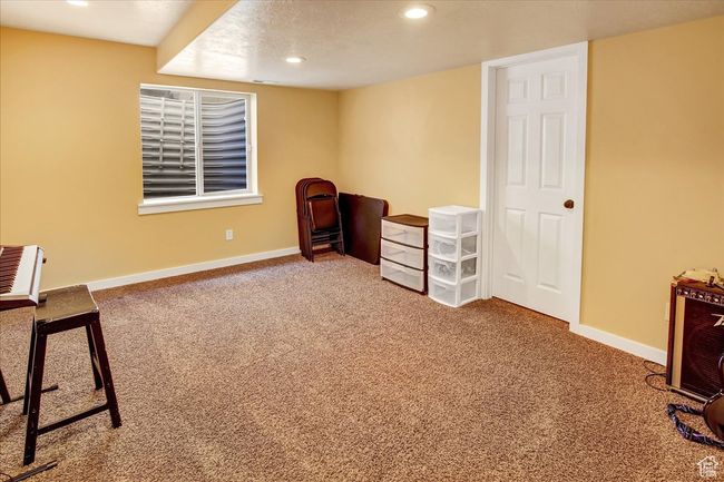 Interior space with baseboards, carpet flooring, and recessed lighting | Image 24