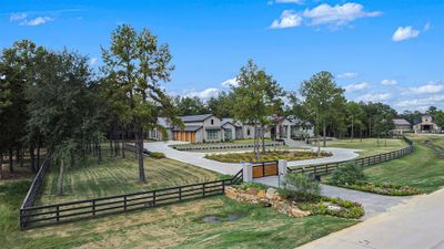 Full view of the front gated entrance into this astonishing home! | Image 2