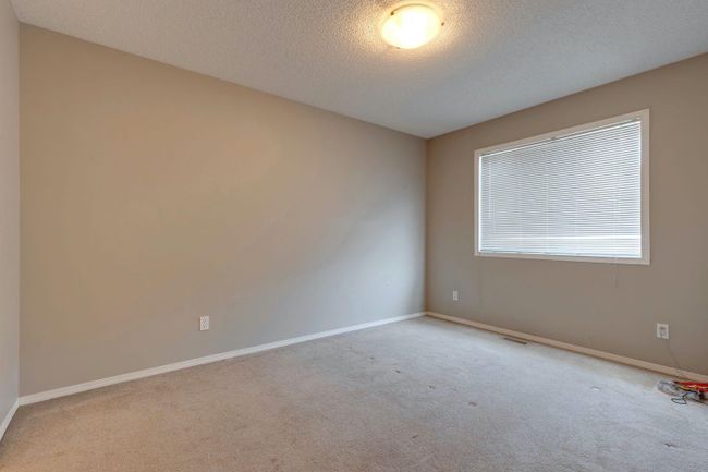 960 Windsong Dr Sw, Home with 3 bedrooms, 2 bathrooms and 4 parking in Airdrie AB | Image 24