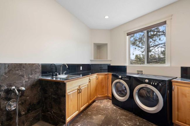 104 Grizzly Rise, House other with 6 bedrooms, 5 bathrooms and null parking in Cochrane AB | Image 23