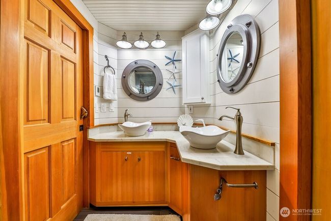 Custom bathroom on main floor with shower. There are 3 bathrooms total. | Image 10