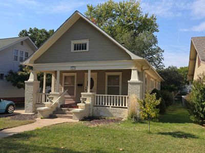 View of front of house featuring a porch and a front yard | Image 2