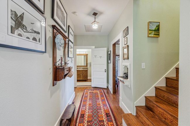 Hallway from the front of the house to the back of the house. | Image 15