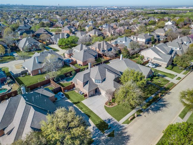 aerial view of home & view of 3-car garage | Image 31
