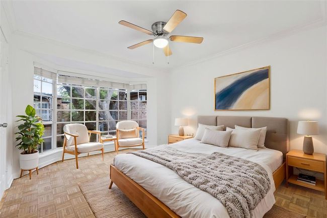 Primary bedroom overlooks picturesque courtyard | Image 14