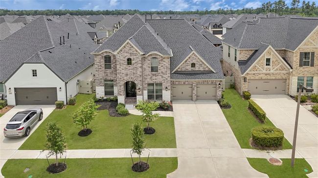 Gorgeous front of the home. Brick and stone exterior. | Image 34