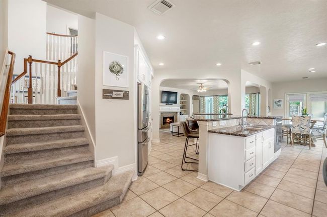 From the kitchen / breakfast area you have easy access to the second floor living with the return staircase. | Image 16