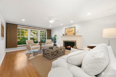 Living Room with Ample Windows and fireplace | Image 3