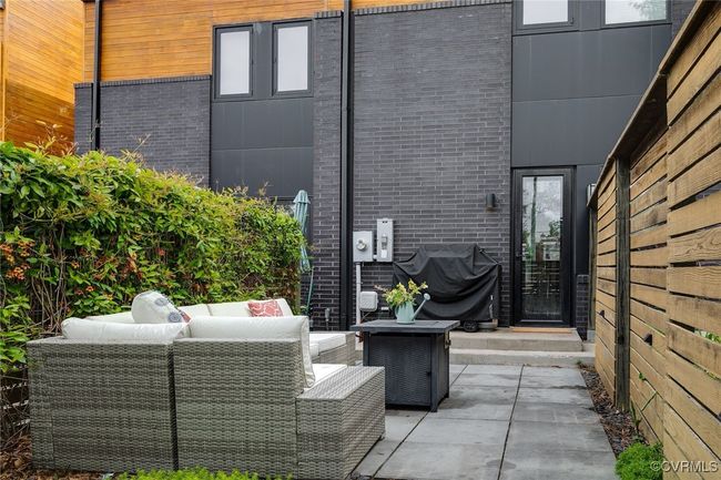 The private back yard includes bonus storage space for all the extras! | Image 42