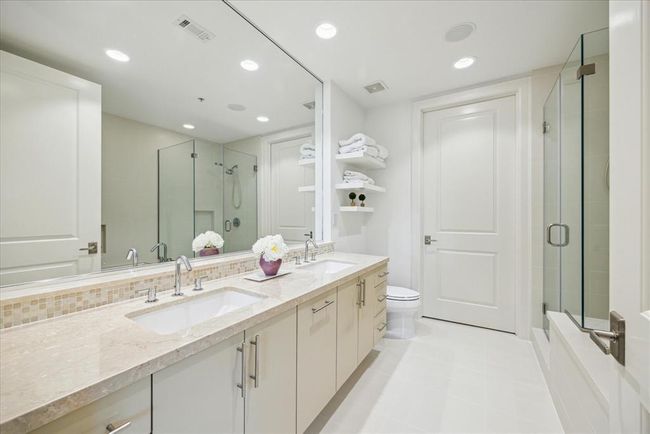 Another view of the primary bath showing ample countertop space. | Image 19