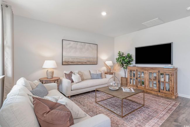 Living room with dark hardwood / wood-style flooring | Image 9