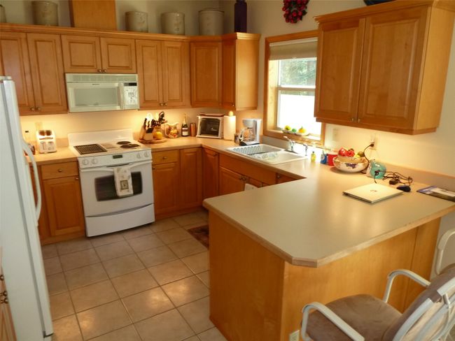 602 Stoner Loop, Condo with 3 bedrooms, 4 bathrooms and null parking in Lakeside MT | Image 6