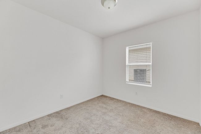 Natural light fills the guest bedrooms, creating bright and airy spaces. | Image 22