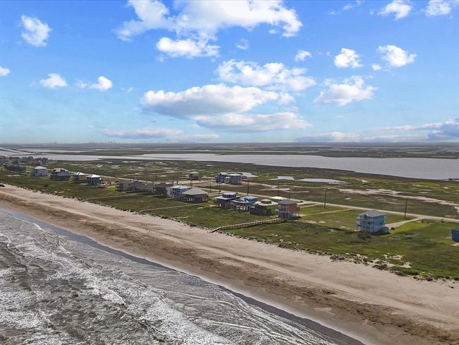 From this panoramic view, you can see just how unique Seahorse Estates truly is: nestled between the Gulf and protected wetlands, every home—including your future beachfront build—gets the benefit of both sunrise and sunset views. | Image 15
