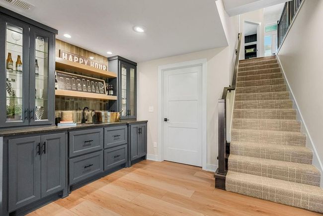 Lower level Rec area with 2 bedrooms and full bath. Photos of previous model home. Not actual listing. Features and sizes may vary. Contact agent for details & showings! | Image 19