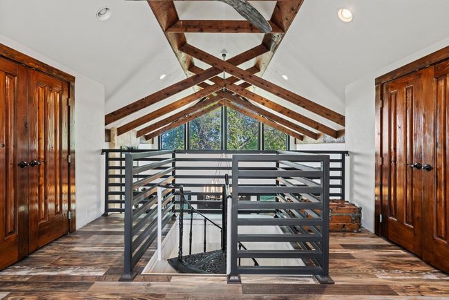 Stairs featuring wood finished floors and recessed lighting | Image 29