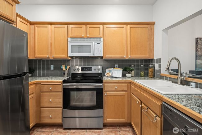 APT-106 - 12439 Ne Totem Lake Way, Condo with 1 bedrooms, 2 bathrooms and 2 parking in Kirkland WA | Image 11