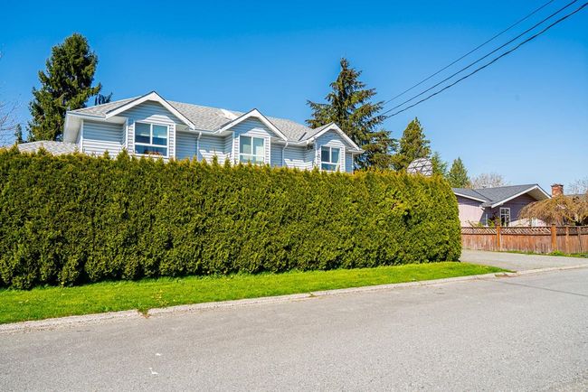 View of front facade featuring fence | Image 34
