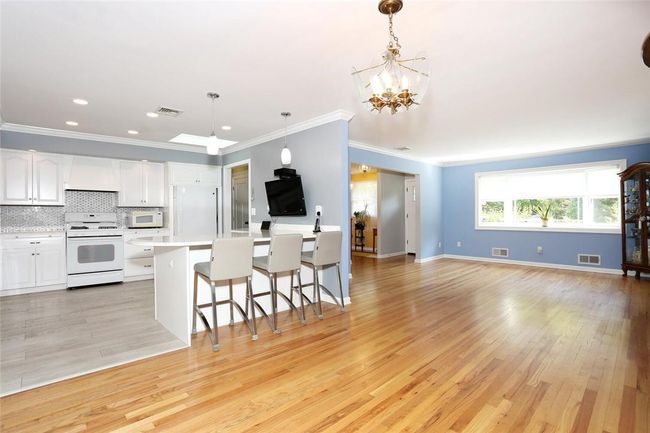 View of living room to dining room to kitchen | Image 4