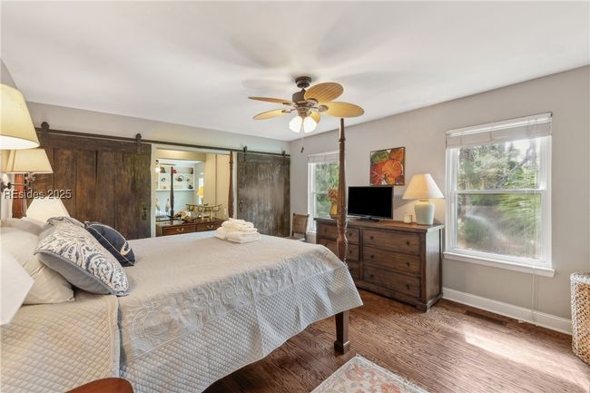 Large primary bedroom with spacious double closets, ample storage, and ensuite full bathroom. | Image 42