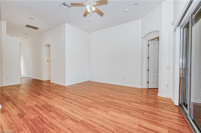 Unfurnished room with ceiling fan and light hardwood / wood-style floors | Image 25