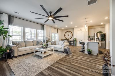 Open living room, dining area and kitchen. | Image 1