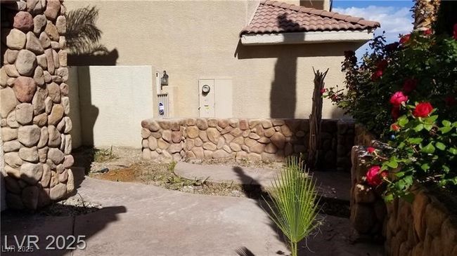 View of side of property featuring stucco siding | Image 16