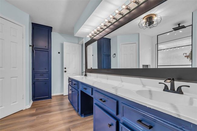Updated primary bathroom with double sinks. | Image 26