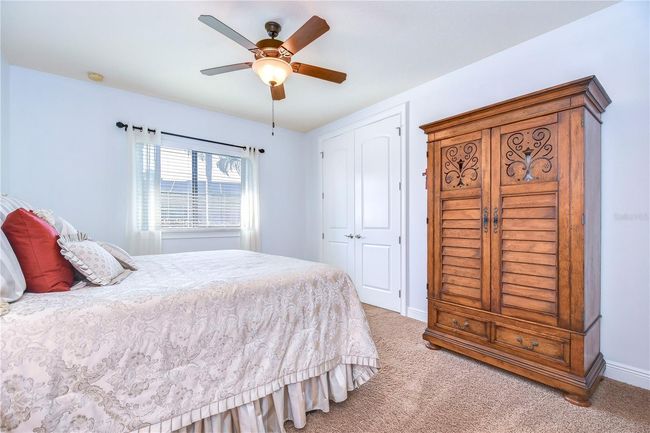 Step into serenity with this charming bedroom. | Image 26