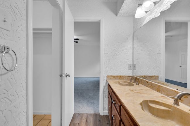 Full bath with double vanity and a sink | Image 24